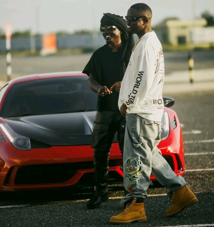 Sarkodie and Kweku Smoke during "Violence" music video shoot Sarkodie and Kweku Smoke during "Violence" music video shoot